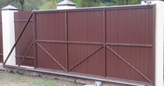 Купить откатные ворота из профнастила Удомля, цена от 1779 руб.